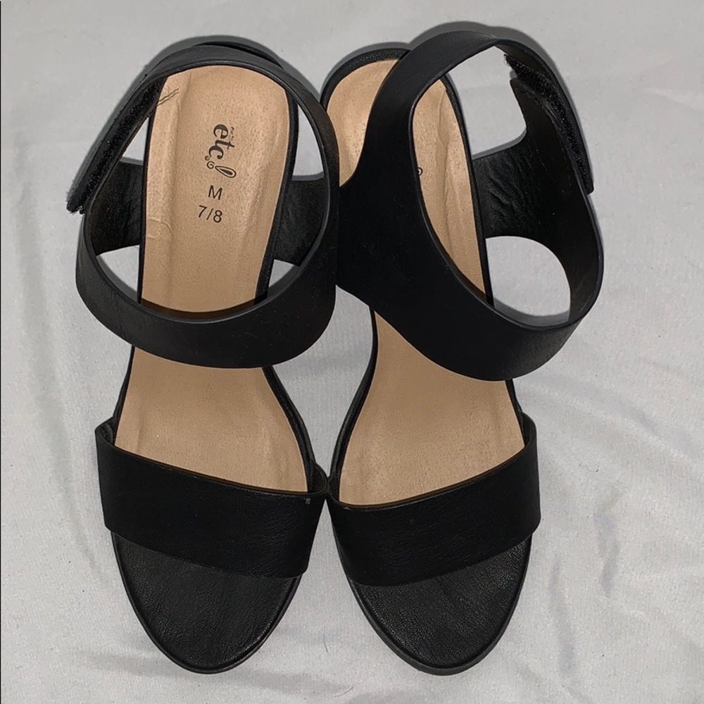 New (worn once) Black adjustable Velcro heels.